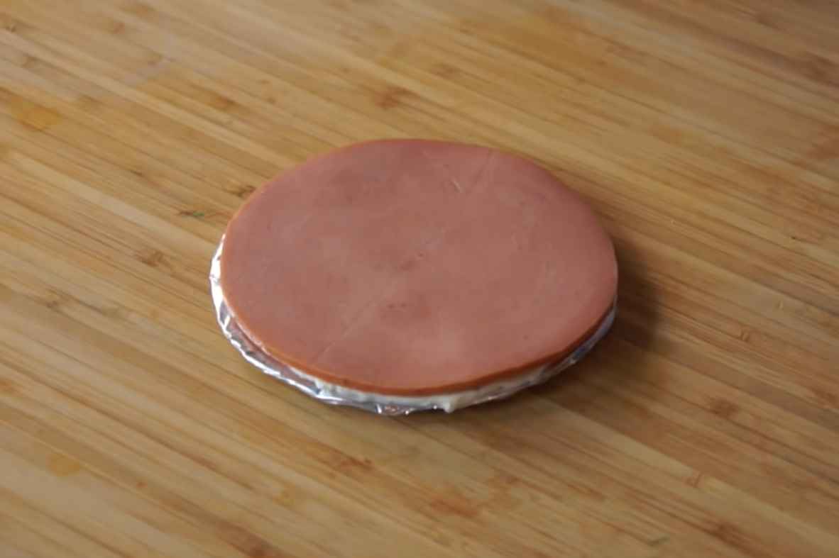 Get cardboard and place your first bologna slice
